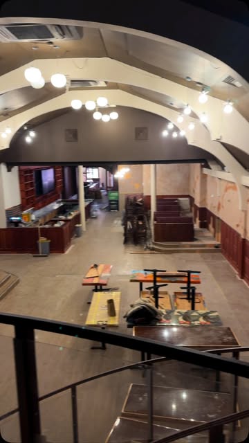 The vaulted Tavern Co. Social interior viewed from the staircase during the fit-out